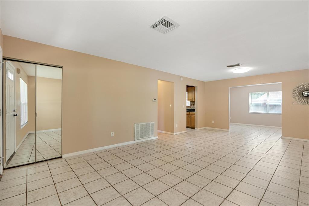 4008 Windswept Avenue Spring Hill, FL 34606 - Photo 4 of 32 a view of an empty room and window