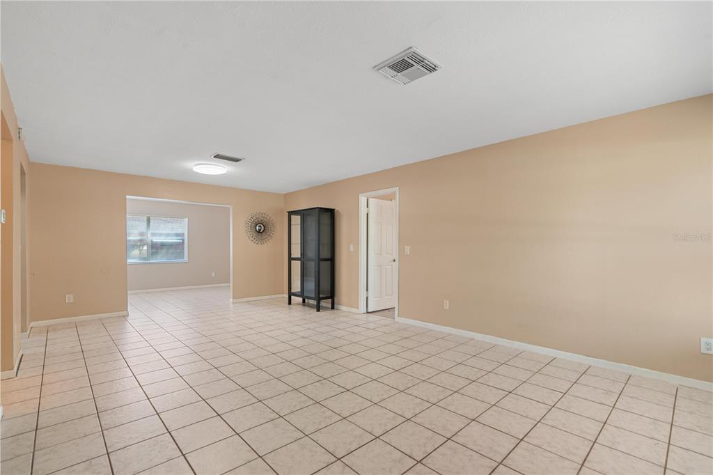 4008 Windswept Avenue Spring Hill, FL 34606 - Photo 5 of 32 a view of an empty room and window