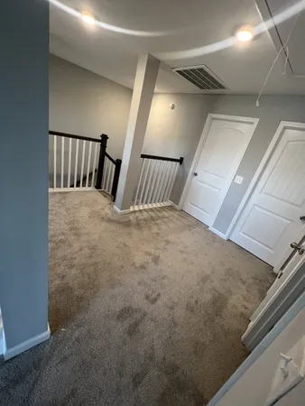 a view of livingroom with furniture and windows