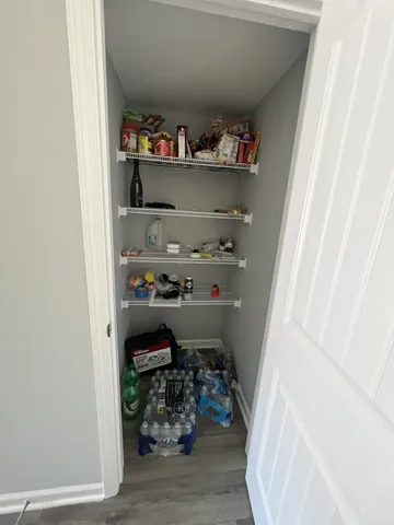 a room with storage and utility