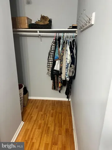 a bathroom with a sink vanity and a mirror