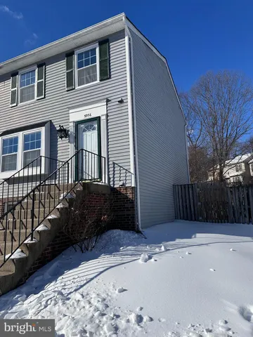 wooden floor in an empty room and a window