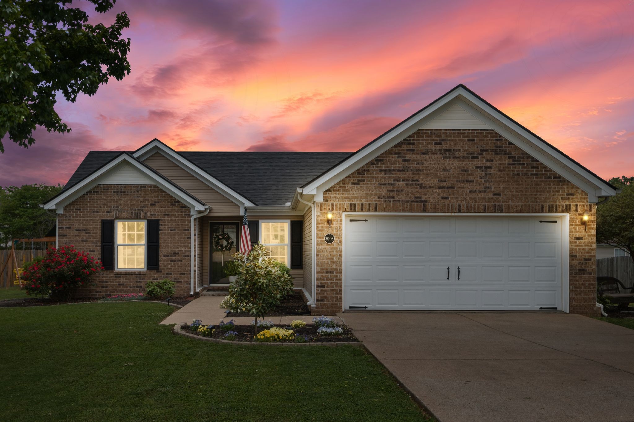 3003 Pandell Court Spring Hill, TN 37174 - Photo 1 of 22 front view of house with a yard