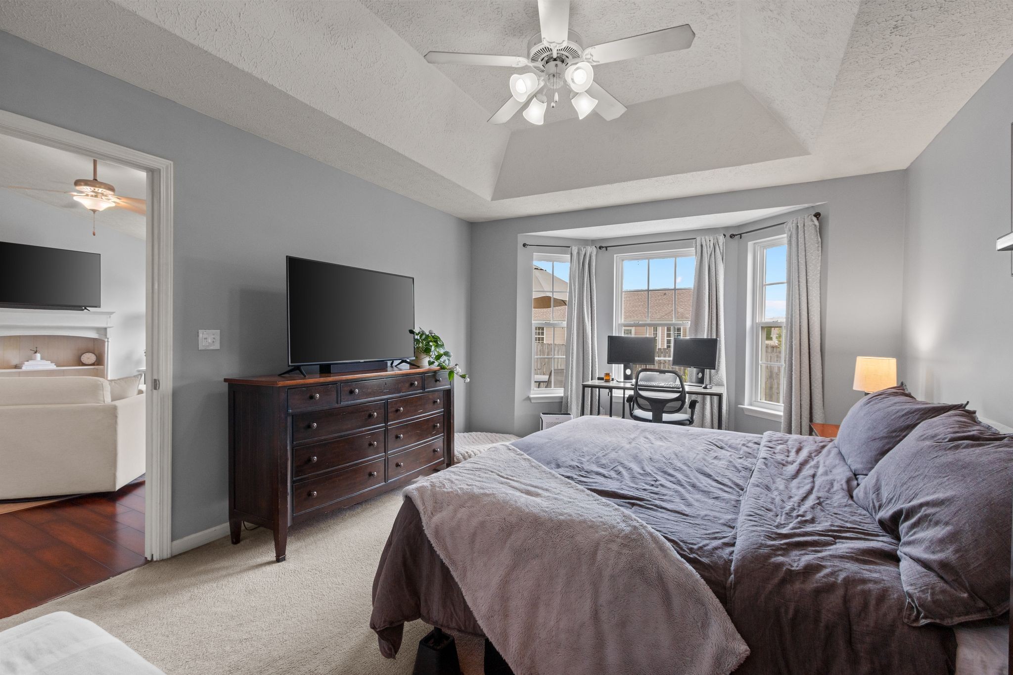 3003 Pandell Court Spring Hill, TN 37174 - Photo 11 of 22 a bedroom with a bed and a flat screen tv