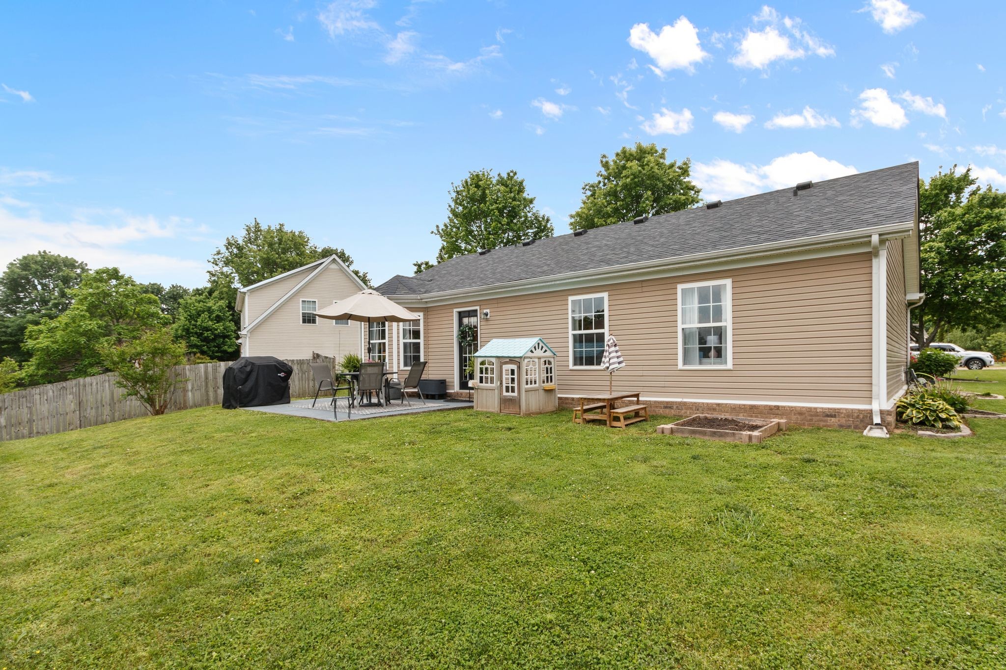 3003 Pandell Court Spring Hill, TN 37174 - Photo 20 of 22 a view of a house with a yard