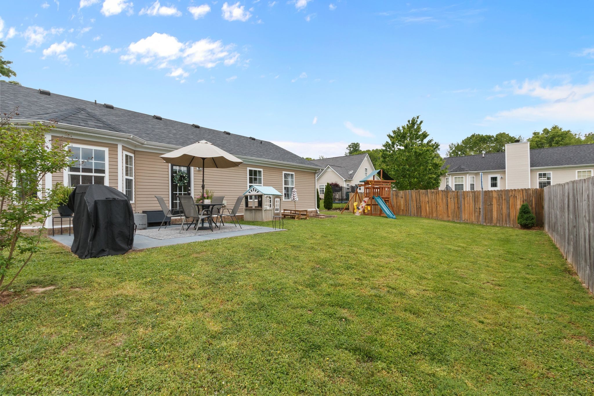 3003 Pandell Court Spring Hill, TN 37174 - Photo 22 of 22 a view of a house with backyard and porch
