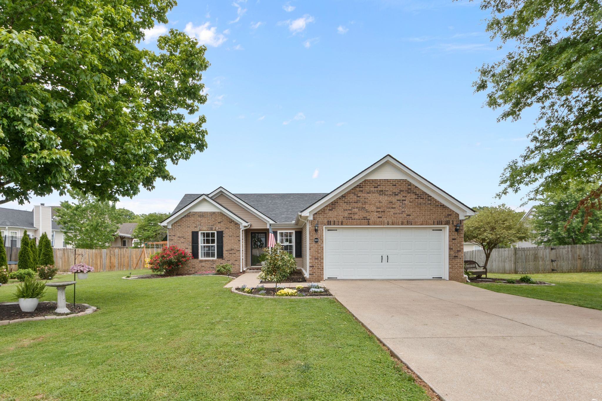 3003 Pandell Court Spring Hill, TN 37174 - Photo 3 of 22 a front view of house with yard and green space