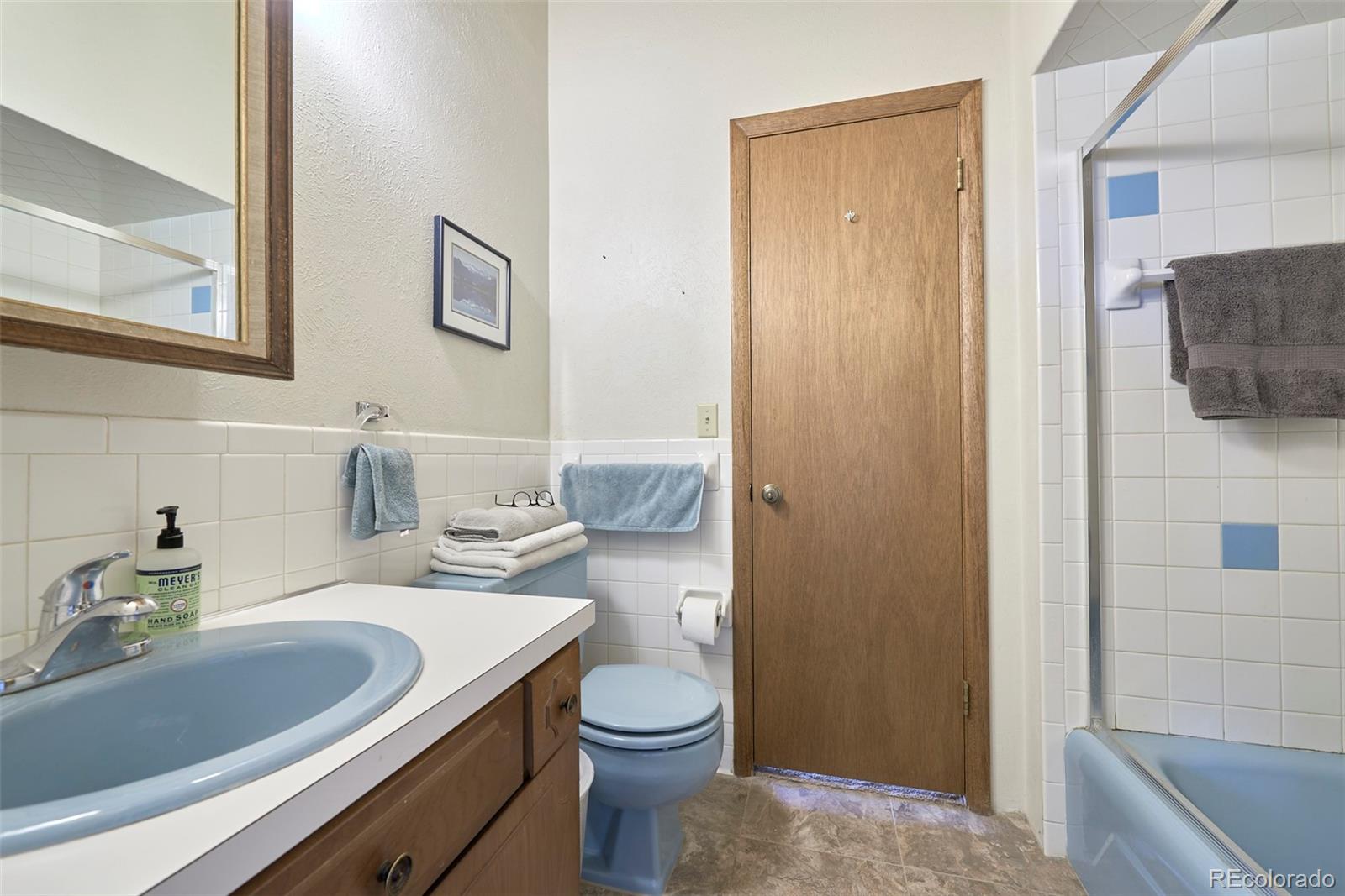 918 Ridge Road Nederland, CO 80466 - Photo 16 of 35 a bathroom with a sink a toilet and shower