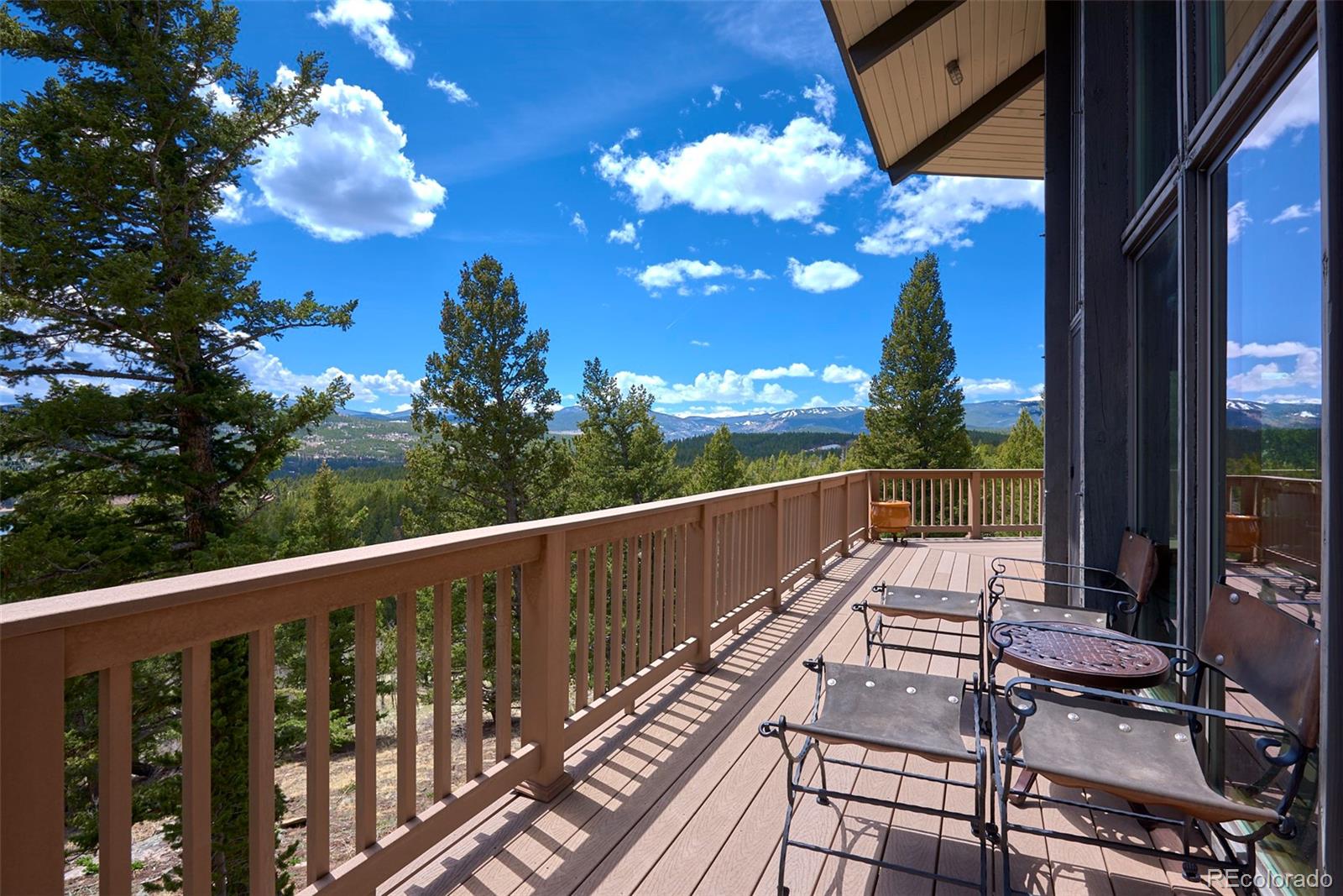 918 Ridge Road Nederland, CO 80466 - Photo 2 of 35 a view of a balcony with wooden floor
