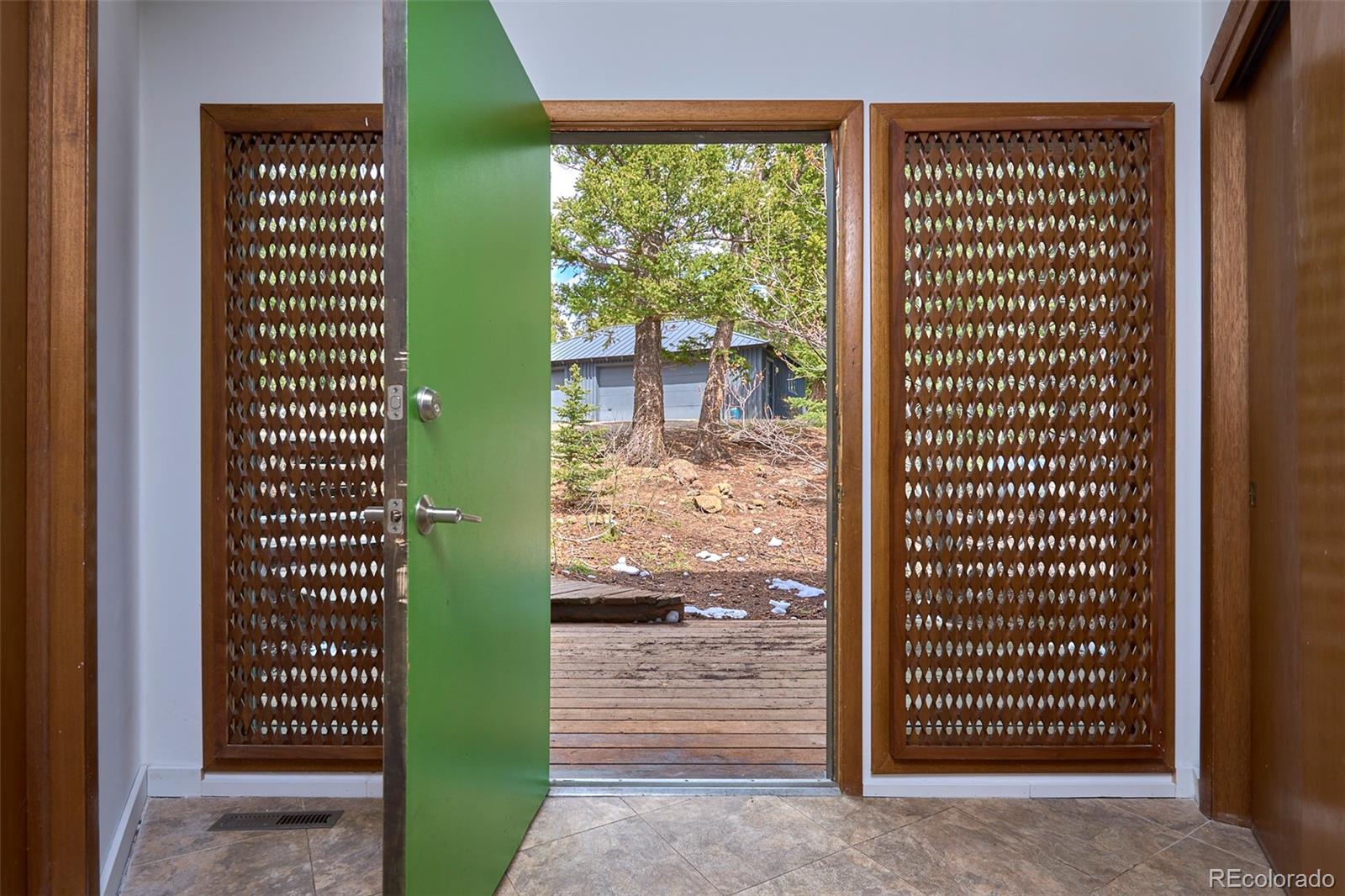 918 Ridge Road Nederland, CO 80466 - Photo 7 of 35 a view of a wooden door of a house