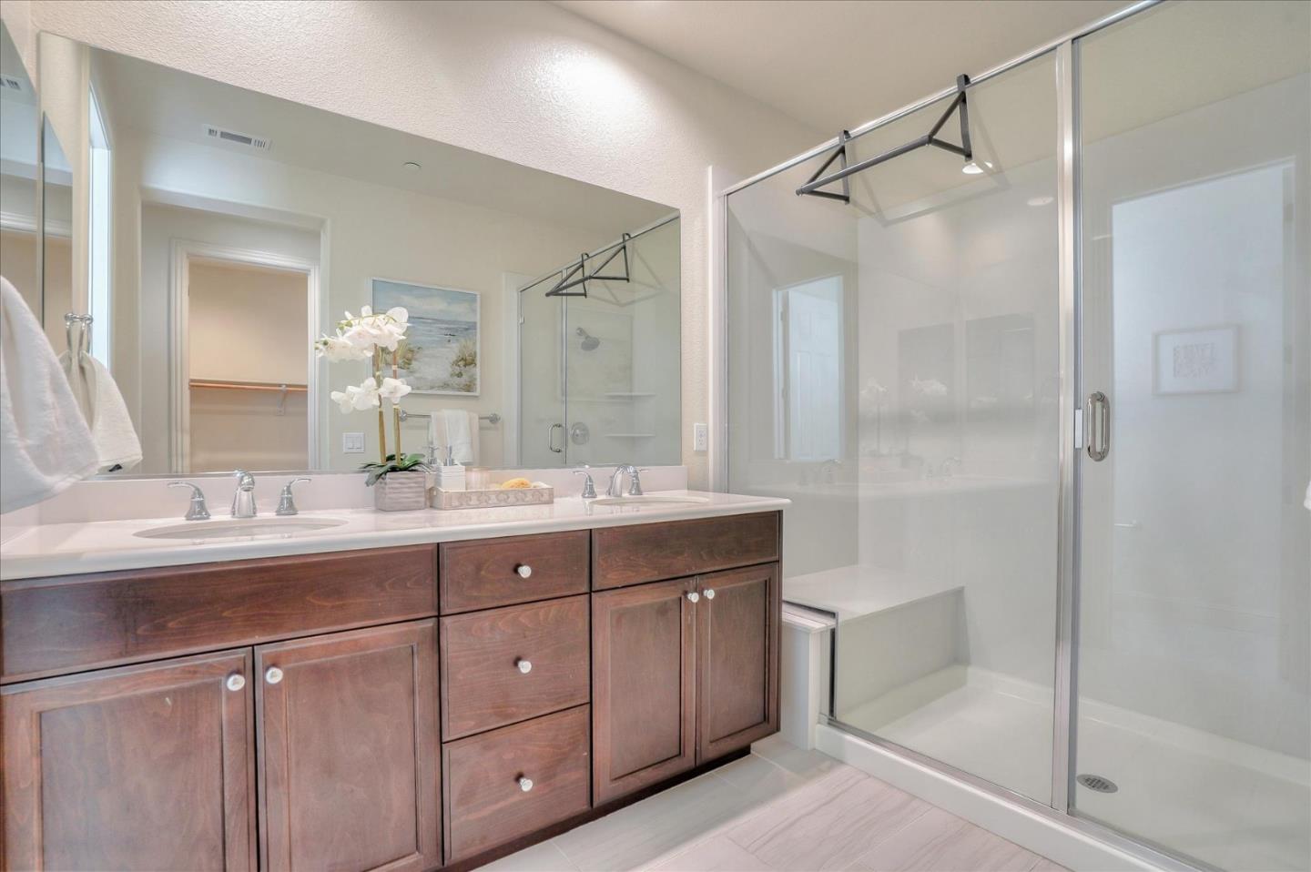 6252 Main Branch Road San Ramon, CA 94582 - Photo 23 of 31 a bathroom with a granite countertop sink mirror and double