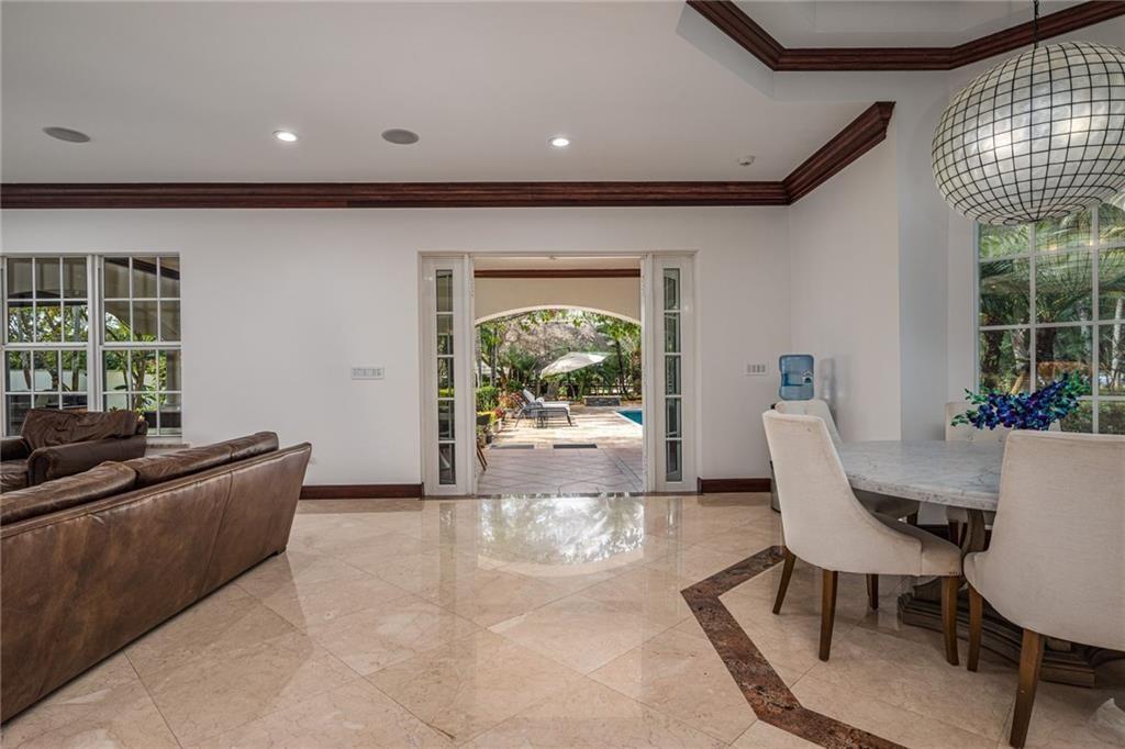 6465 Southwest 178th Avenue Southwest Ranches, FL 33331 - Photo 11 of 36 a living room with furniture and a large window