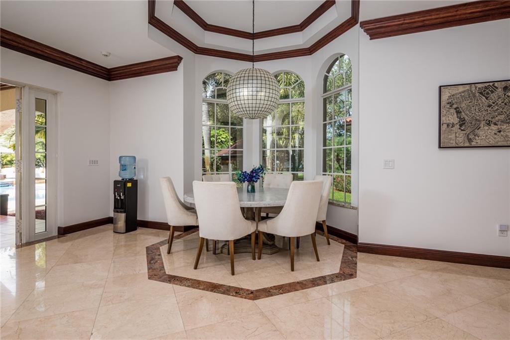 6465 Southwest 178th Avenue Southwest Ranches, FL 33331 - Photo 13 of 36 a view of a dining room with furniture window and outside view