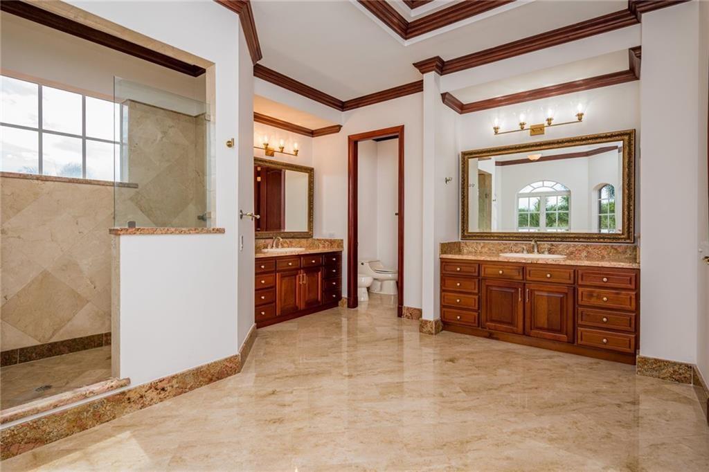 6465 Southwest 178th Avenue Southwest Ranches, FL 33331 - Photo 17 of 36 a view of a hallway and a livingroom with furniture
