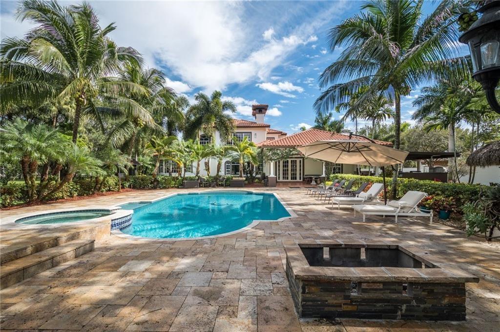 6465 Southwest 178th Avenue Southwest Ranches, FL 33331 - Photo 30 of 36 a front view of a house with a yard