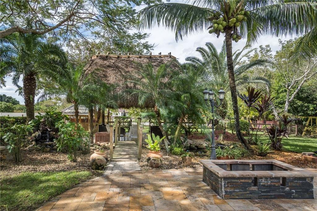6465 Southwest 178th Avenue Southwest Ranches, FL 33331 - Photo 34 of 36 a view of a yard with palm tree