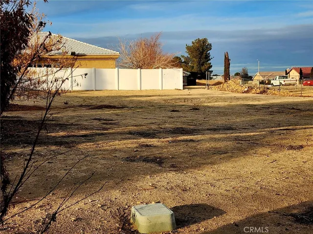 a view of road with ocean view