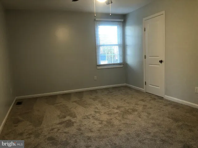 a bathroom with a sink a mirror and shower