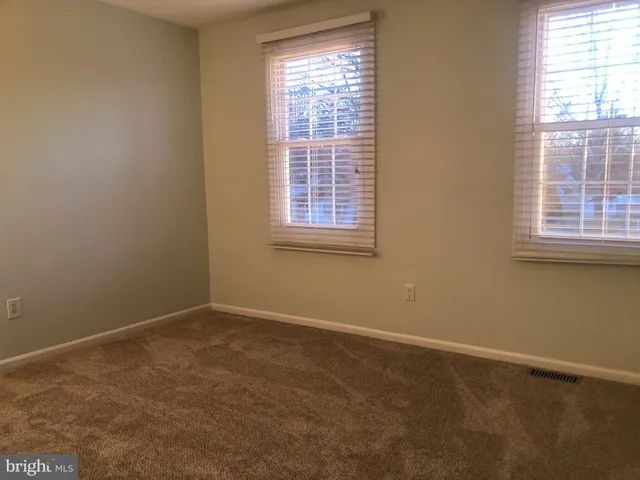 an empty room with closet