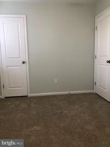 a view of a window in an empty room