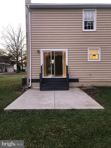 a view of backyard of a house