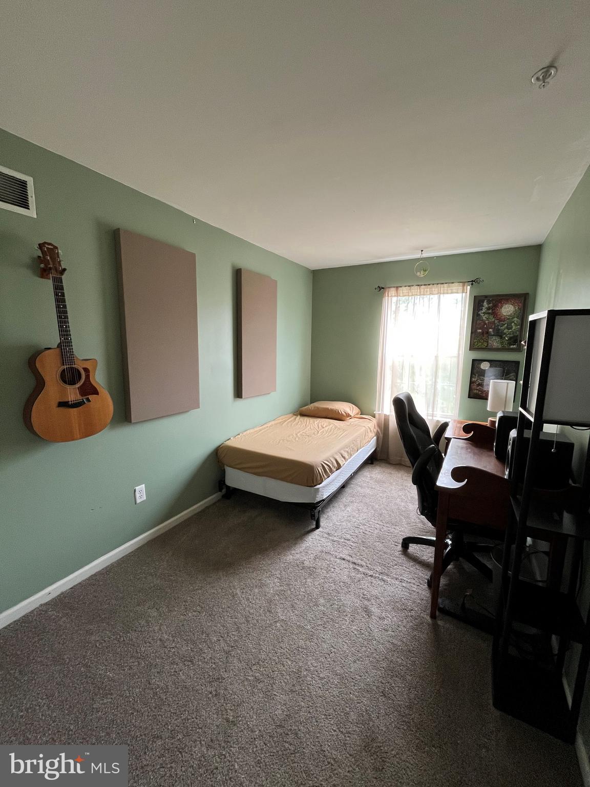 79 Mule Deer Court Elkton, MD 21921 - Photo 17 of 21 a bedroom with bed and window