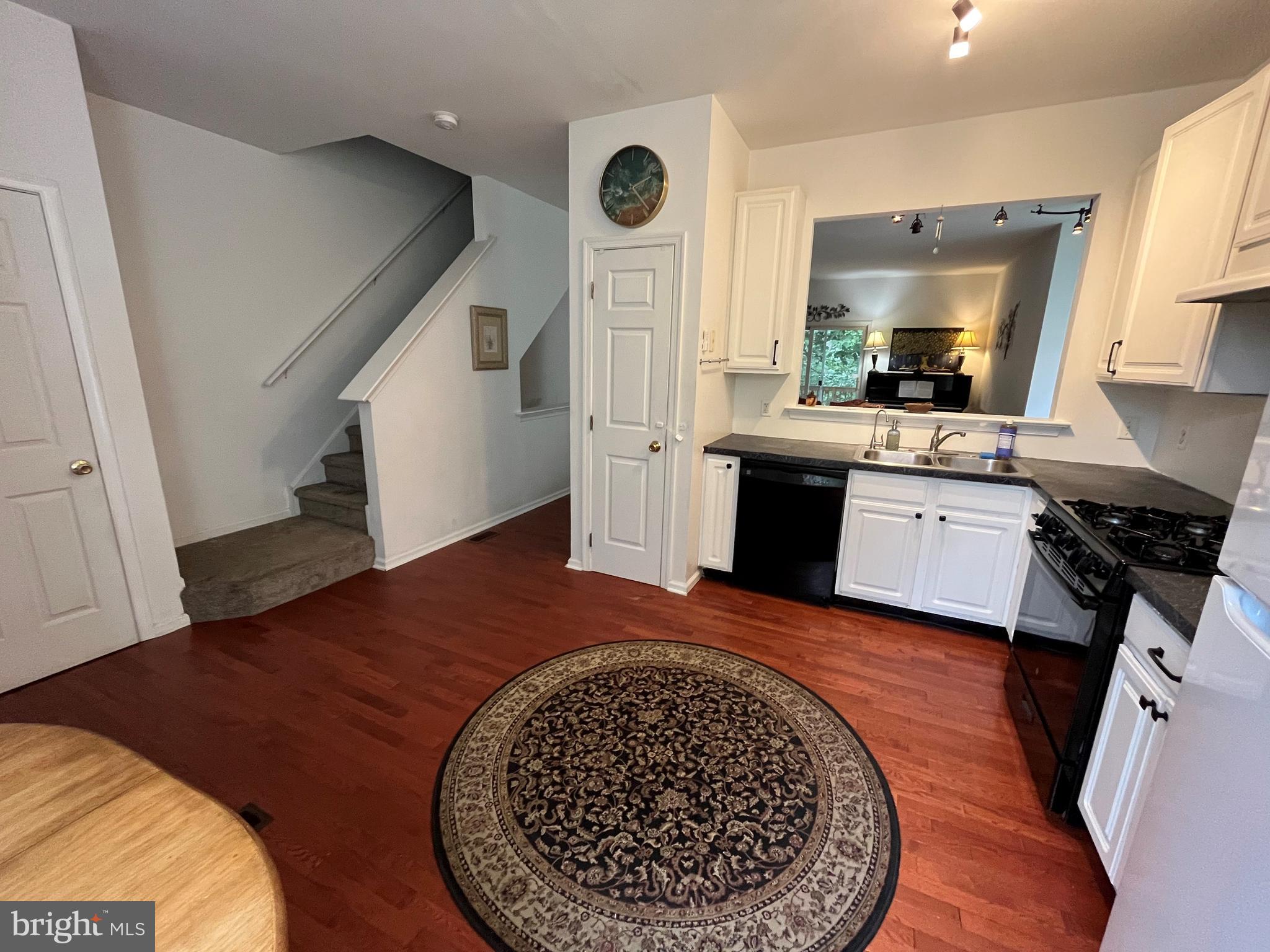 79 Mule Deer Court Elkton, MD 21921 - Photo 6 of 21 a view of a kitchen with kitchen island wooden floor and stainless steel appliances