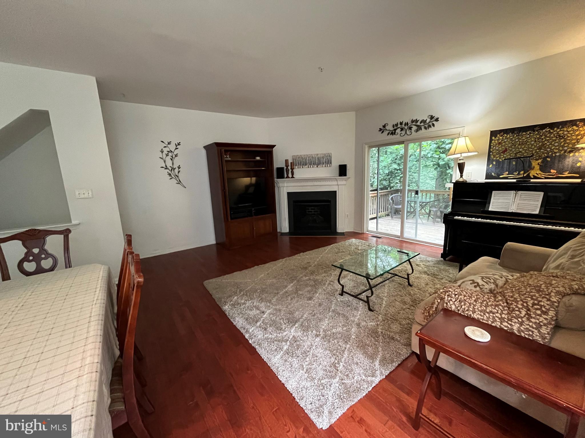 79 Mule Deer Court Elkton, MD 21921 - Photo 10 of 21 a living room with furniture and a fireplace