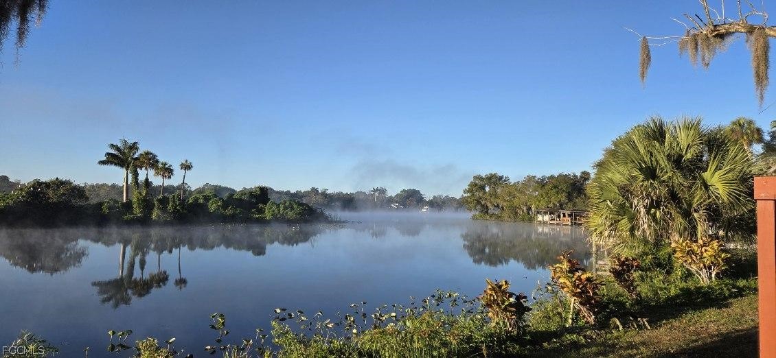 17520 Taylor Road Alva, FL 33920 - Photo 3 of 7 a view of a lake with houses