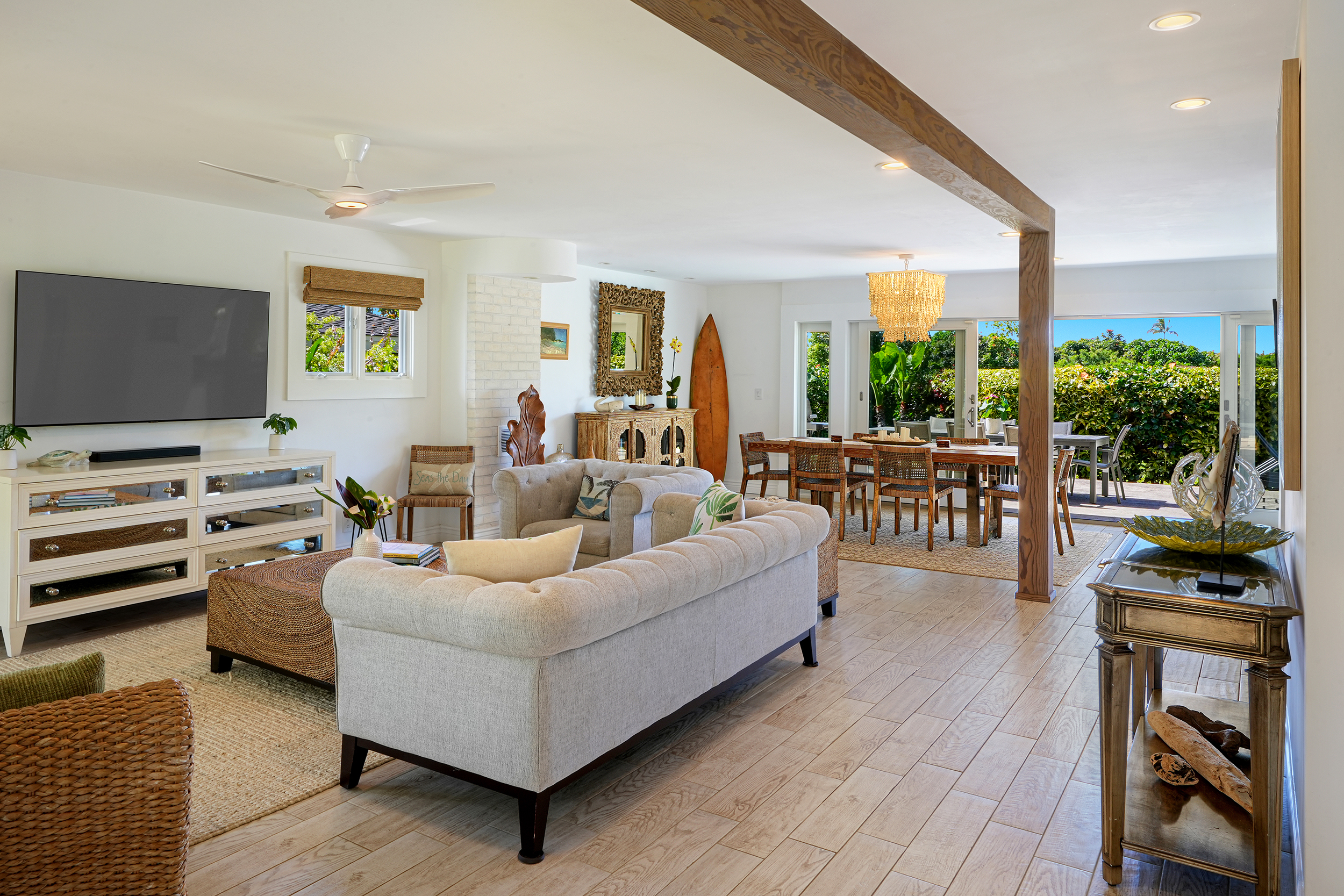 5348 Honoiki Road Princeville, HI 96722 - Photo 4 of 25 a living room with furniture and a flat screen tv