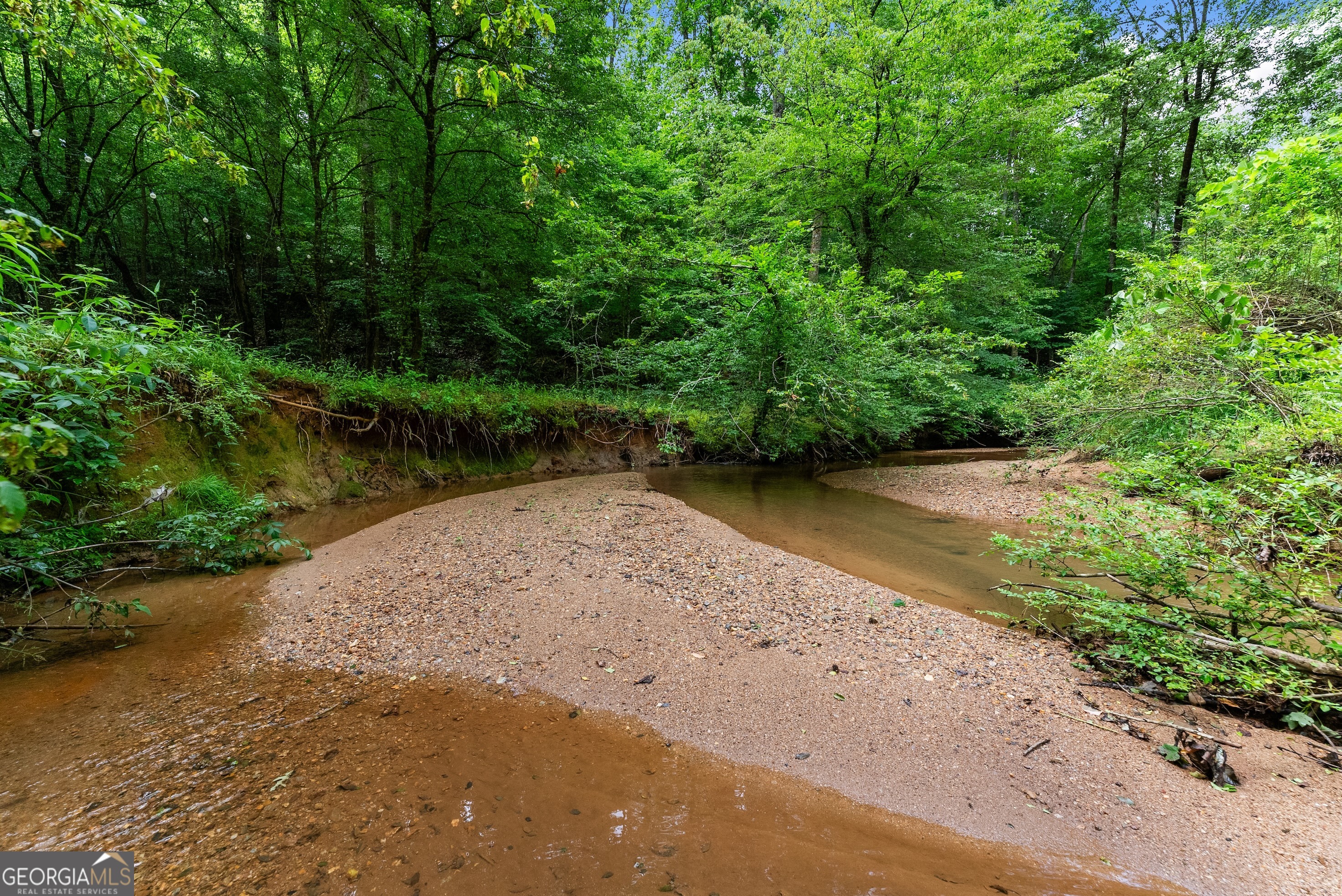 0 Hubert Harris Road Cornelia, GA 30531 - Photo 9 of 19 a view of a lake with beach and outdoor space