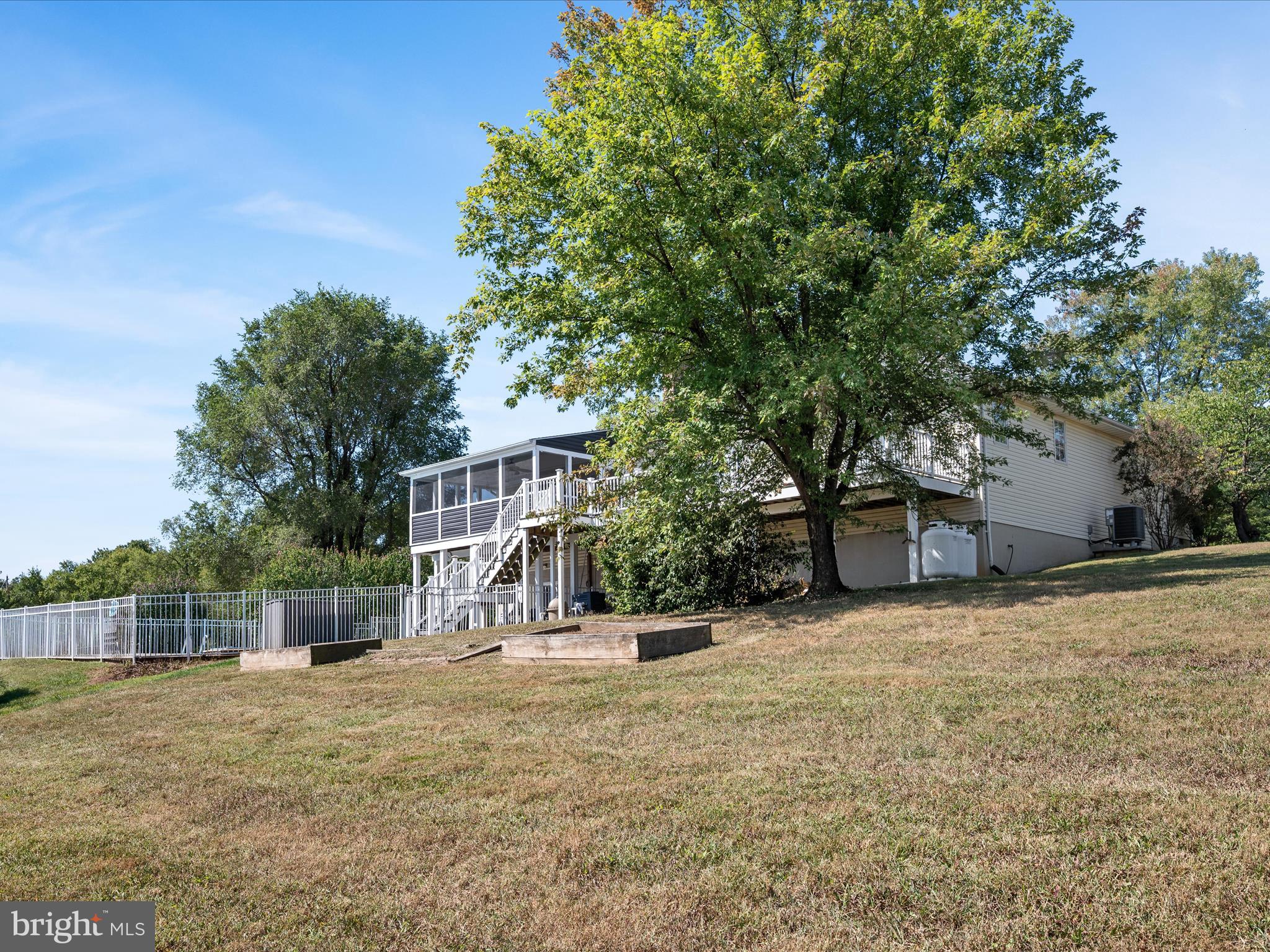252 Punkin Ridge Drive Clear Brook, VA 22624 - Photo 22 of 80 a view of a house with a yard