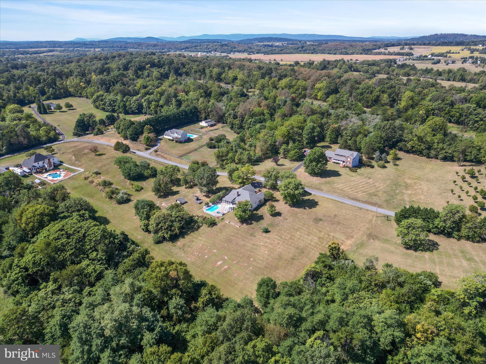 252 Punkin Ridge Drive Clear Brook, VA 22624 - Photo 25 of 80 an aerial view of a forest with houses