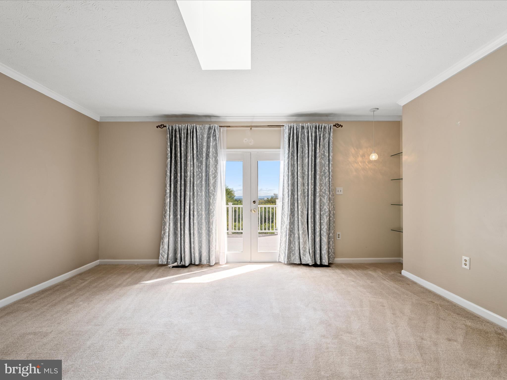 252 Punkin Ridge Drive Clear Brook, VA 22624 - Photo 32 of 80 an empty room with a door