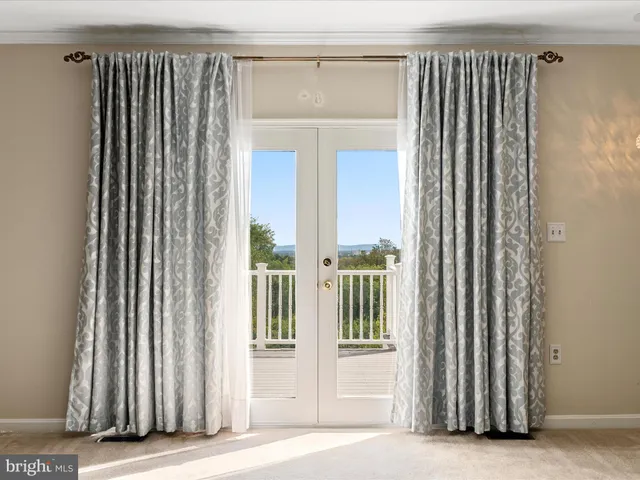 a bathroom with a shower sink and mirror