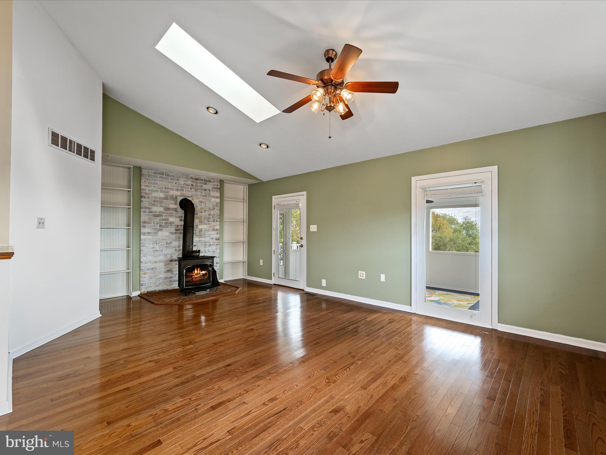 252 Punkin Ridge Drive Clear Brook, VA 22624 - Photo 44 of 80 a view of empty room with wooden floor and fan