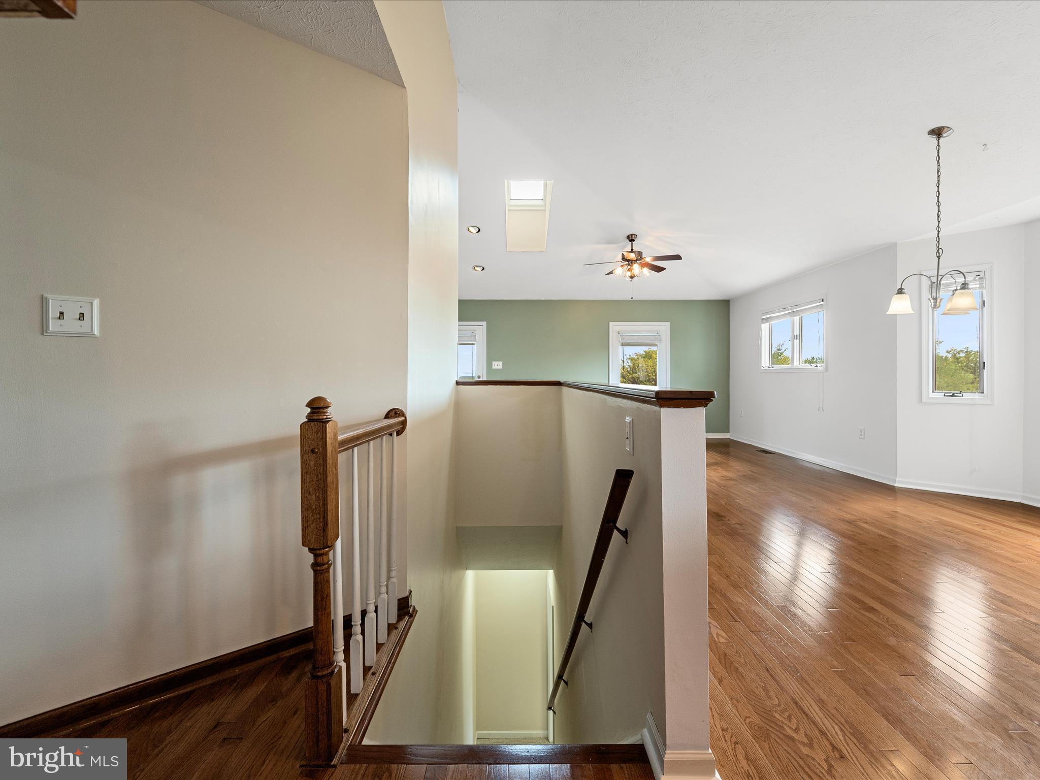 252 Punkin Ridge Drive Clear Brook, VA 22624 - Photo 64 of 80 a view of a kitchen with furniture and wooden floor