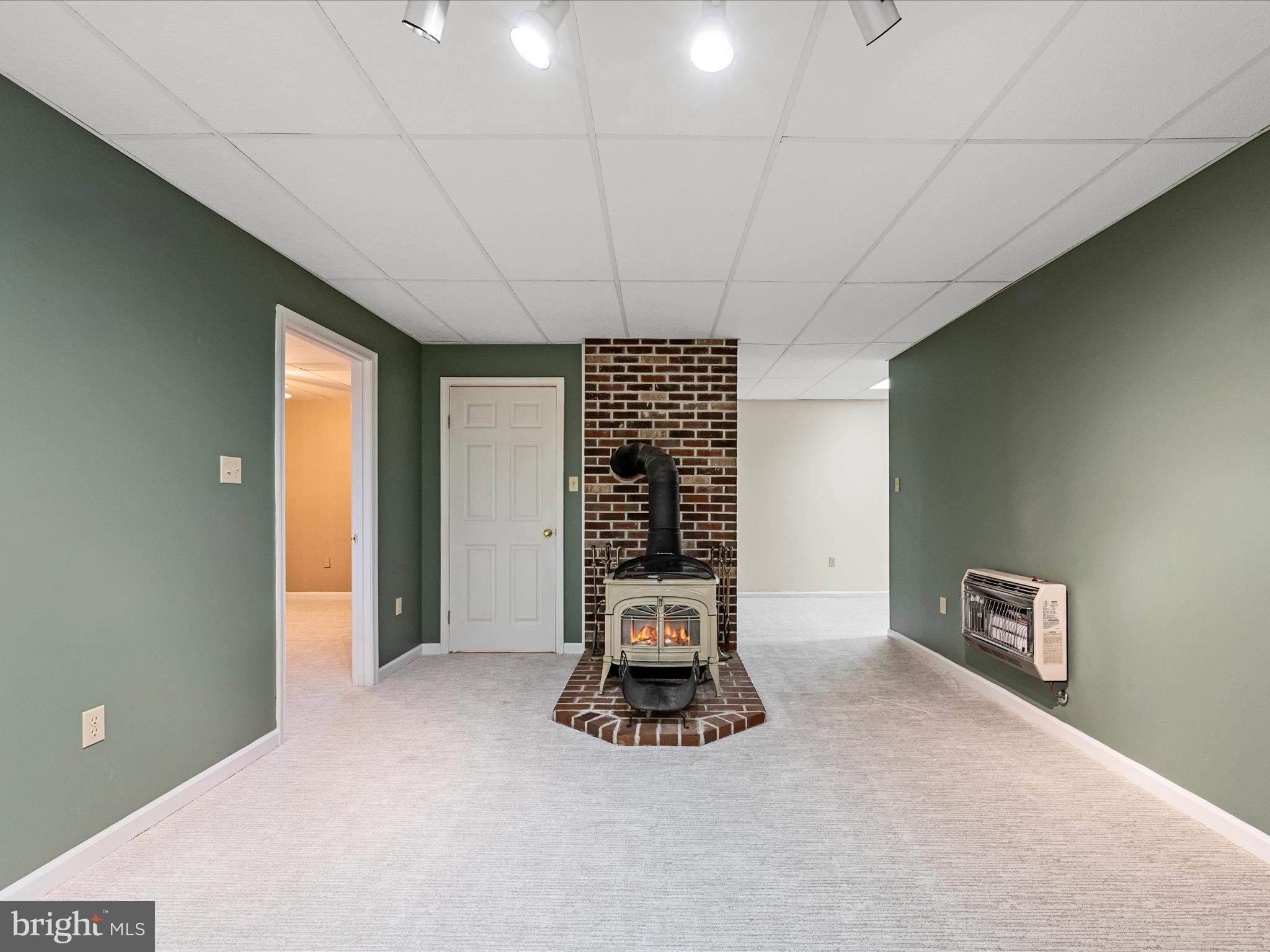 252 Punkin Ridge Drive Clear Brook, VA 22624 - Photo 69 of 80 a view of an empty room with a fireplace