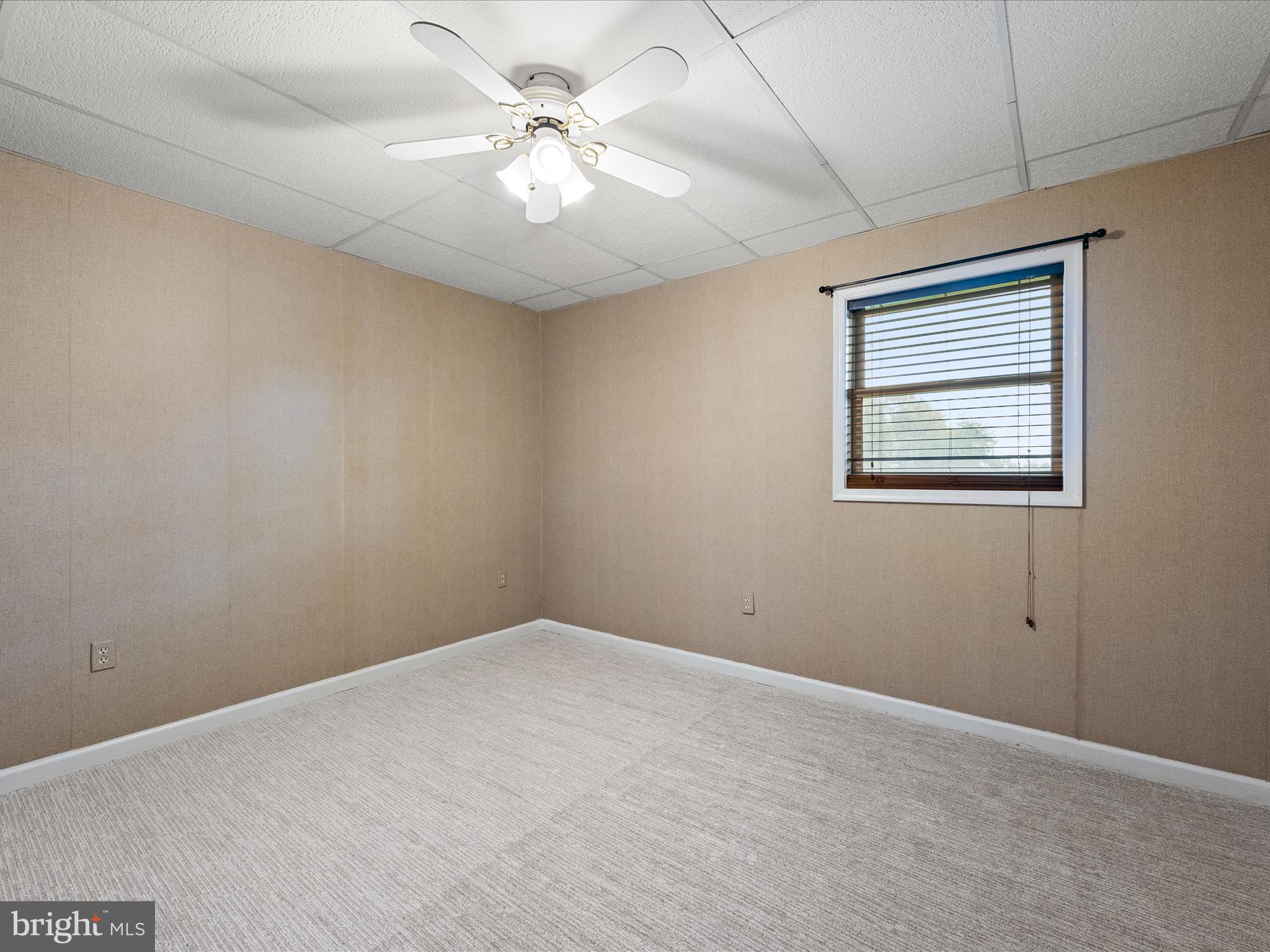 252 Punkin Ridge Drive Clear Brook, VA 22624 - Photo 72 of 80 a view of an empty room with a window