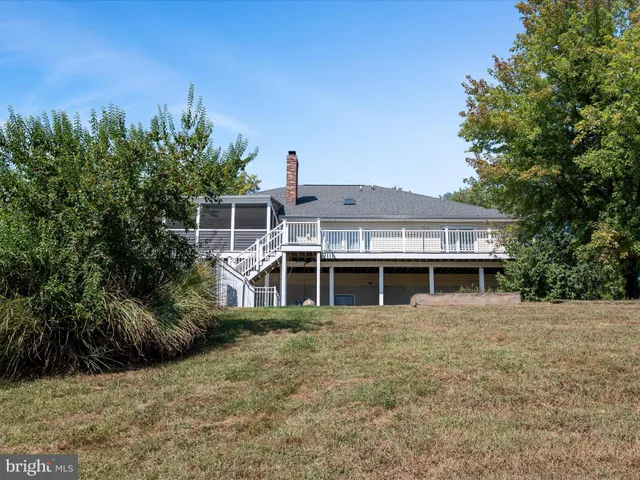 a view of a house with a roof deck