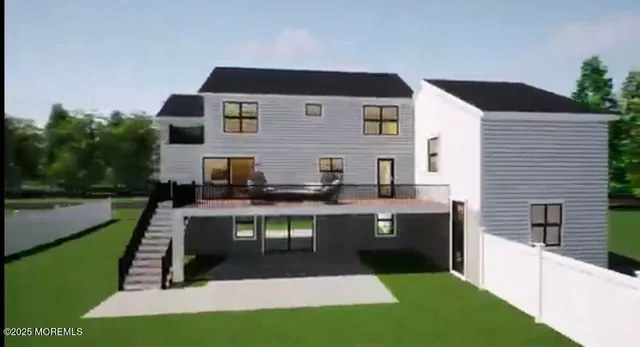 a view of ocean with a multi story building