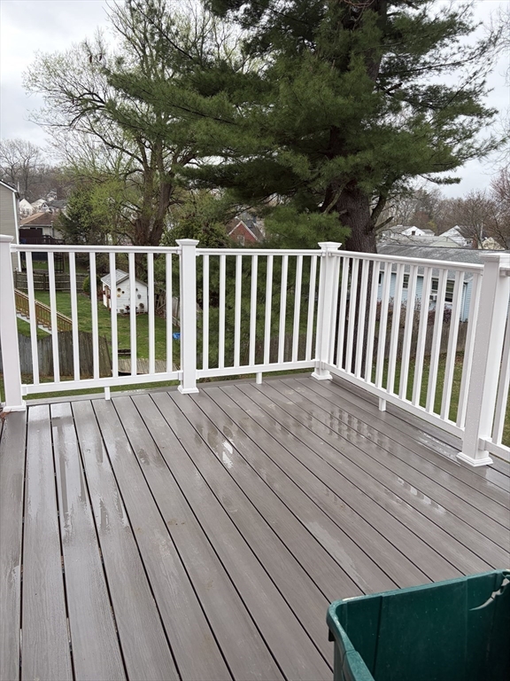76 Valmor Street Worcester, MA 01604 - Photo 8 of 20 a view of wooden balcony