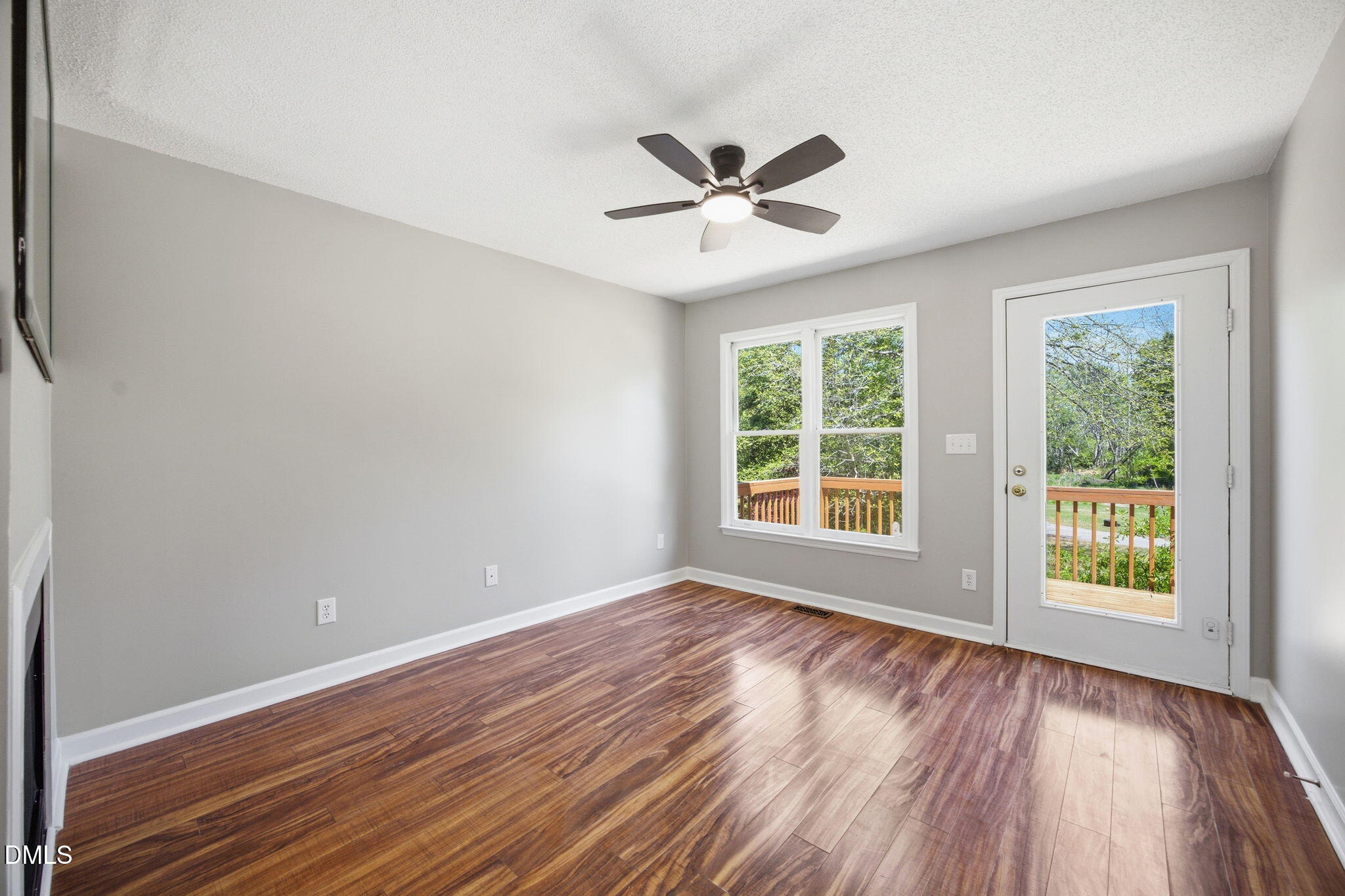 1626 Oakland Hills Way Raleigh, NC 27604 - Photo 12 of 25 a view of a big room with wooden floor and windows in a room