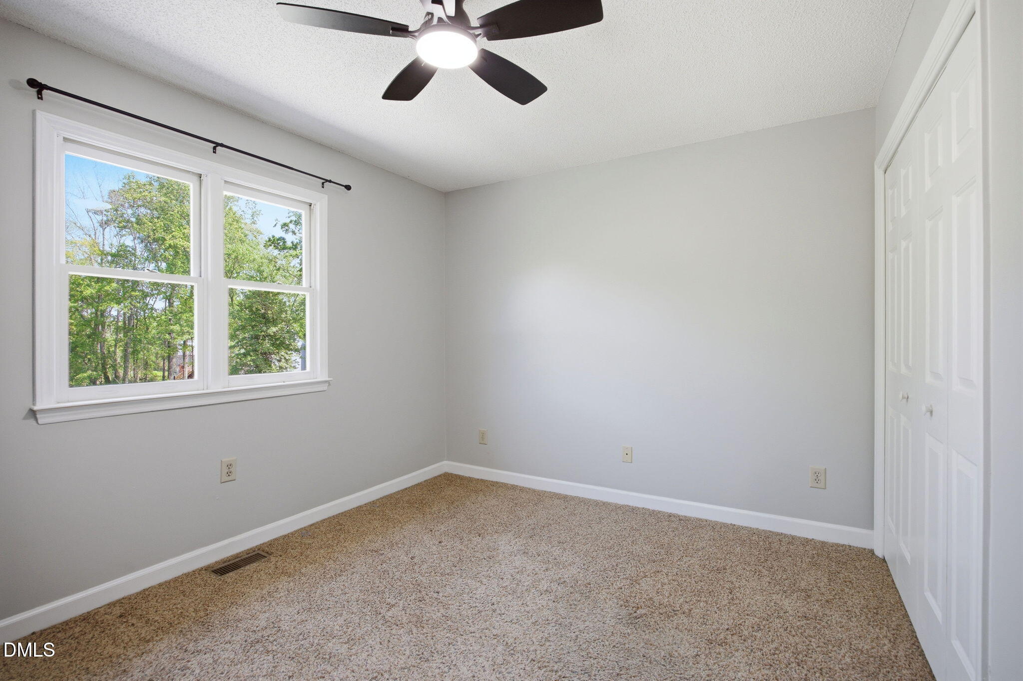 1626 Oakland Hills Way Raleigh, NC 27604 - Photo 19 of 25 a view of an empty room with a window