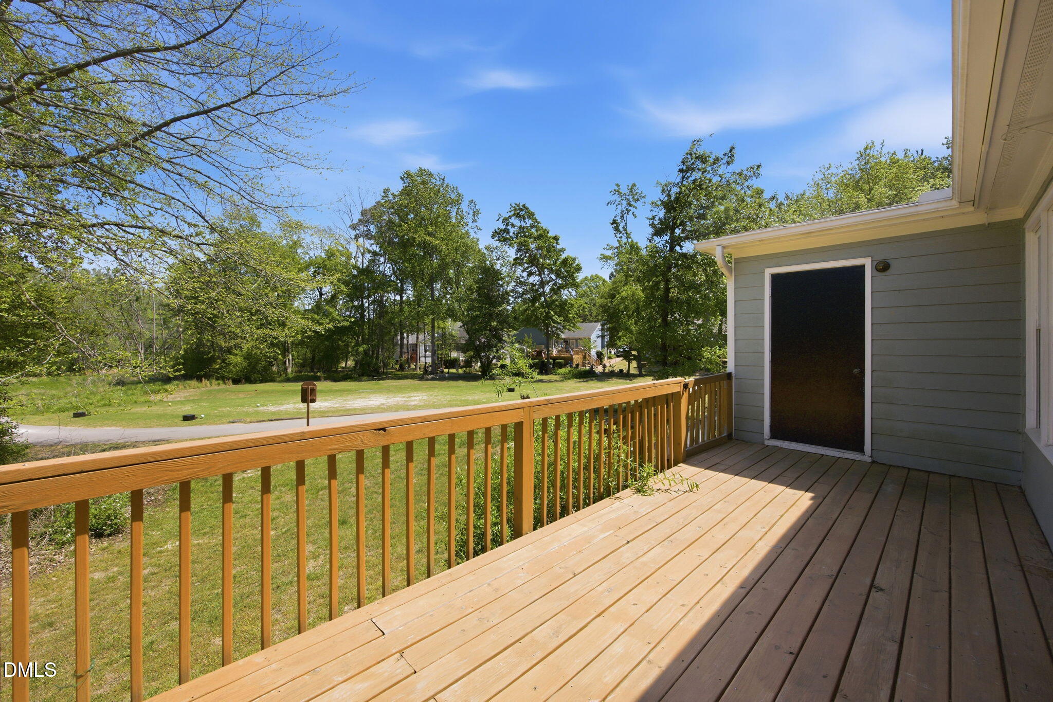 1626 Oakland Hills Way Raleigh, NC 27604 - Photo 21 of 25 a view of balcony with wooden floor and fence