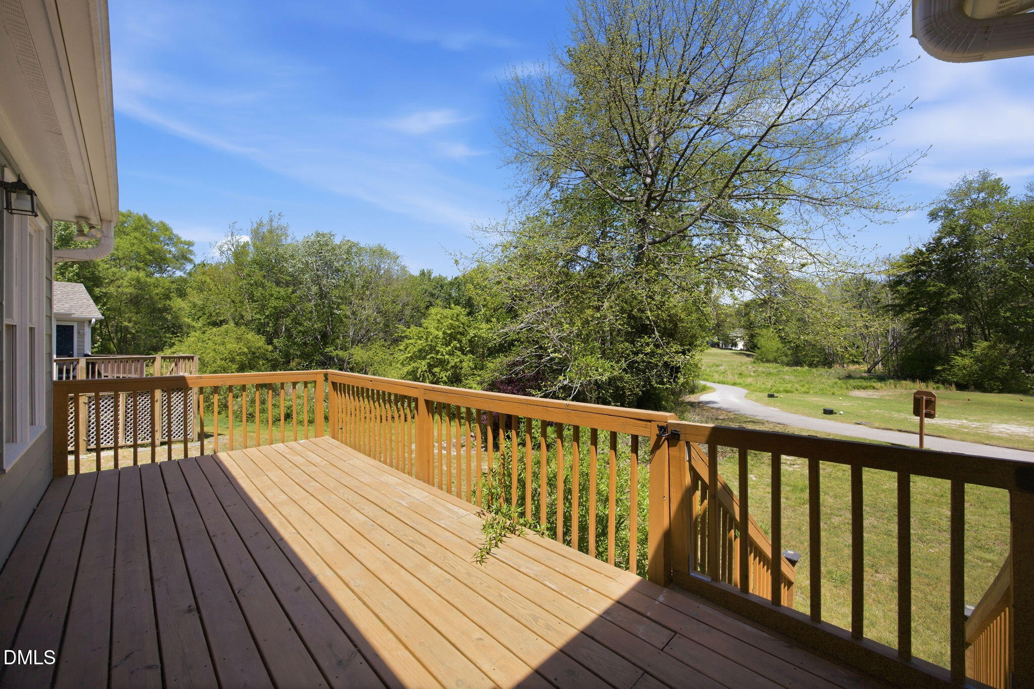 1626 Oakland Hills Way Raleigh, NC 27604 - Photo 22 of 25 a view of balcony with wooden floor and fence