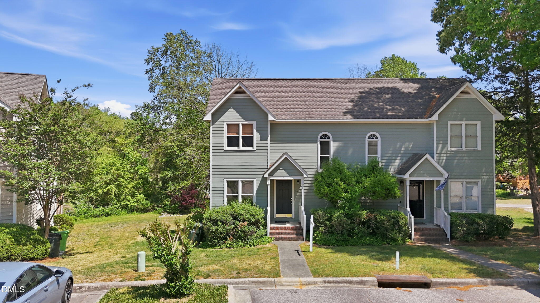 1626 Oakland Hills Way Raleigh, NC 27604 - Photo 2 of 25 a front view of a house with a yard