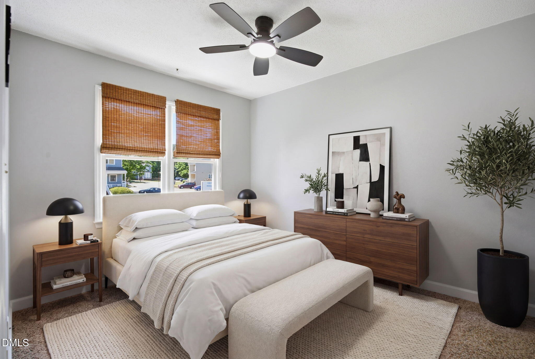 1626 Oakland Hills Way Raleigh, NC 27604 - Photo 6 of 25 a bedroom with a large bed and a chandelier fan