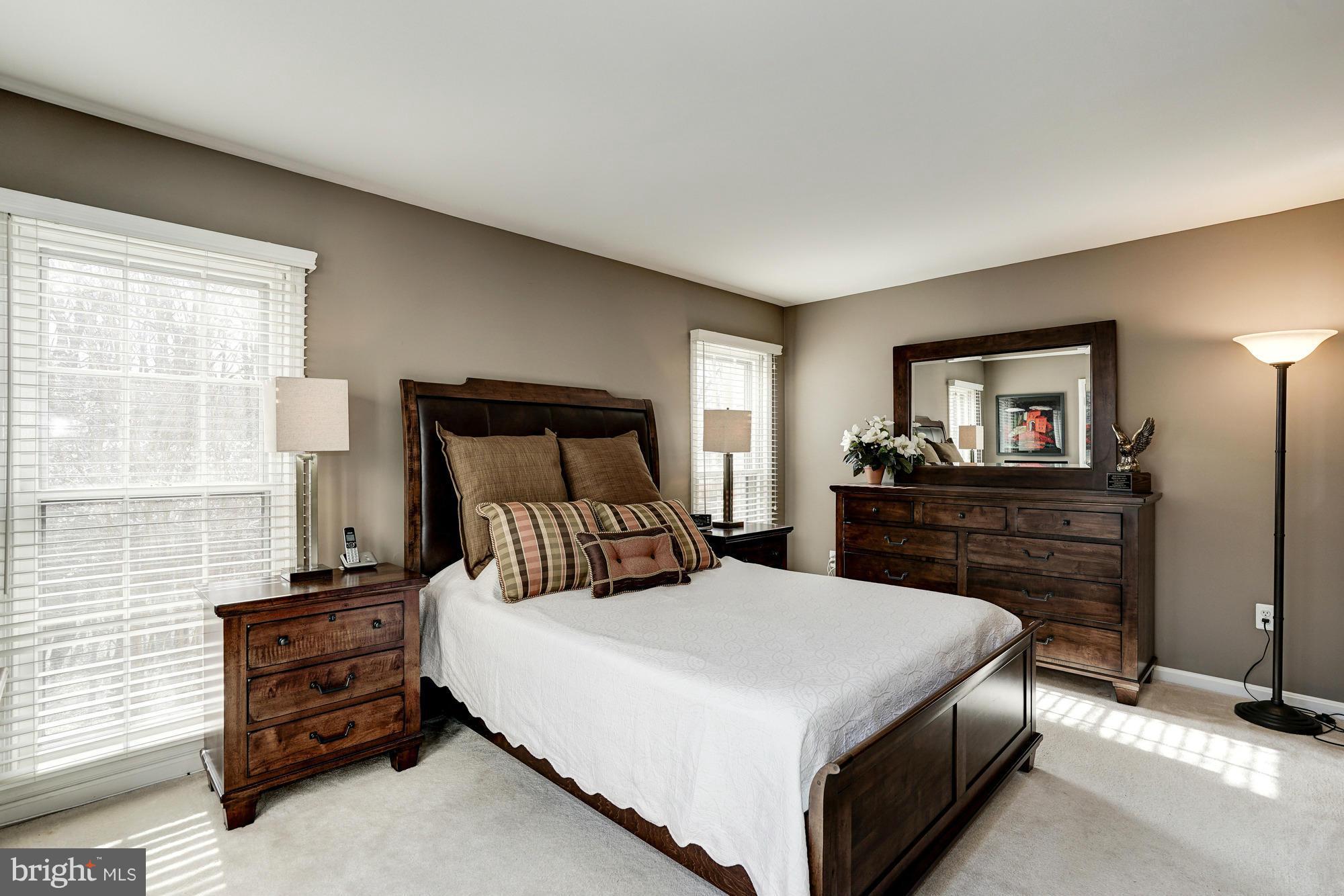 7415 Ridge Oak Court Springfield, VA 22153 - Photo 11 of 30 a bedroom with a bed and furniture