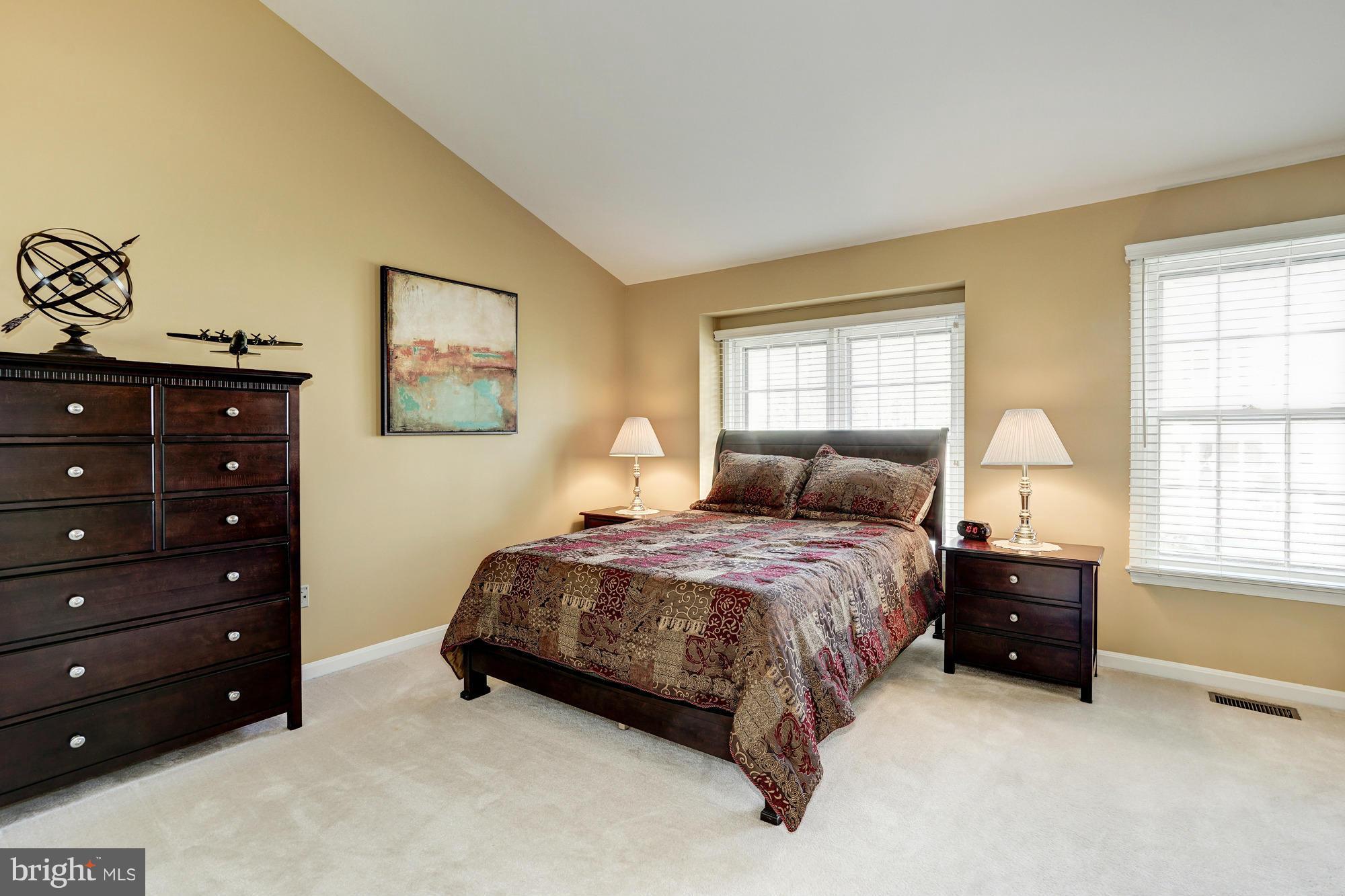 7415 Ridge Oak Court Springfield, VA 22153 - Photo 17 of 30 a bedroom with a bed and a window